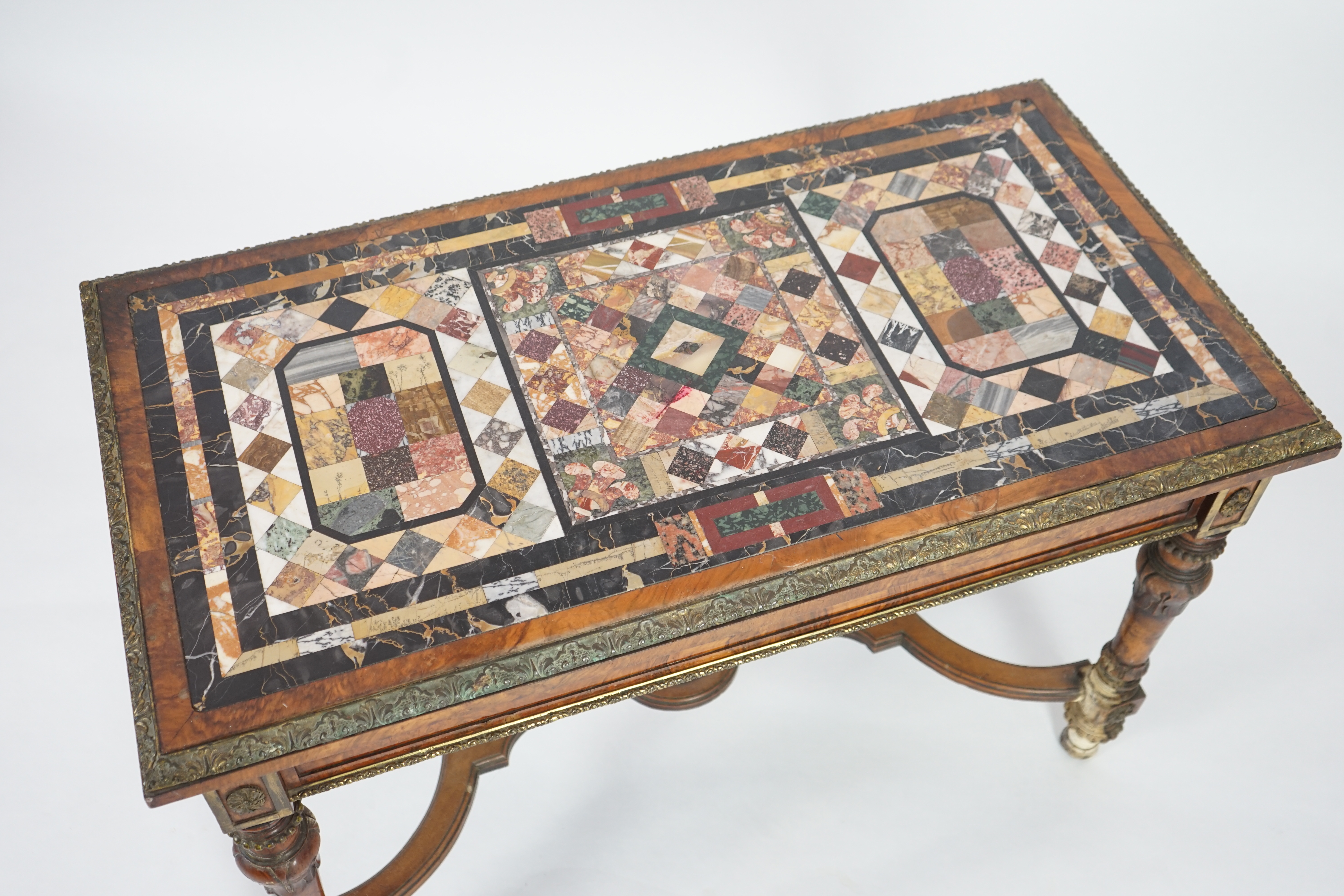 A mid Victorian ormolu mounted walnut pietra dura top centre table